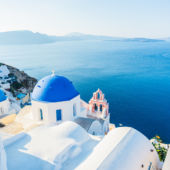 Blue Waters And Domes Of Santorini